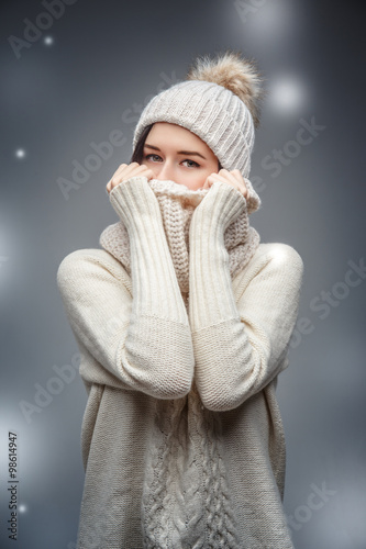 A girl in winter clothes.