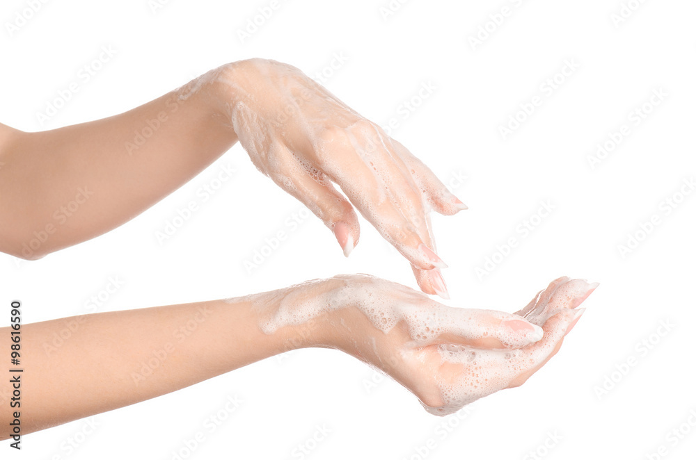 Hygiene and health protection topic: a woman's hand in soapsuds isolated on white background in studio Hygiene and health protection topic: a woman's hand in soapsuds isolated on white background in studio