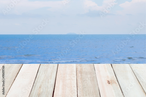 Wooden texture with sea background. © shinji3802