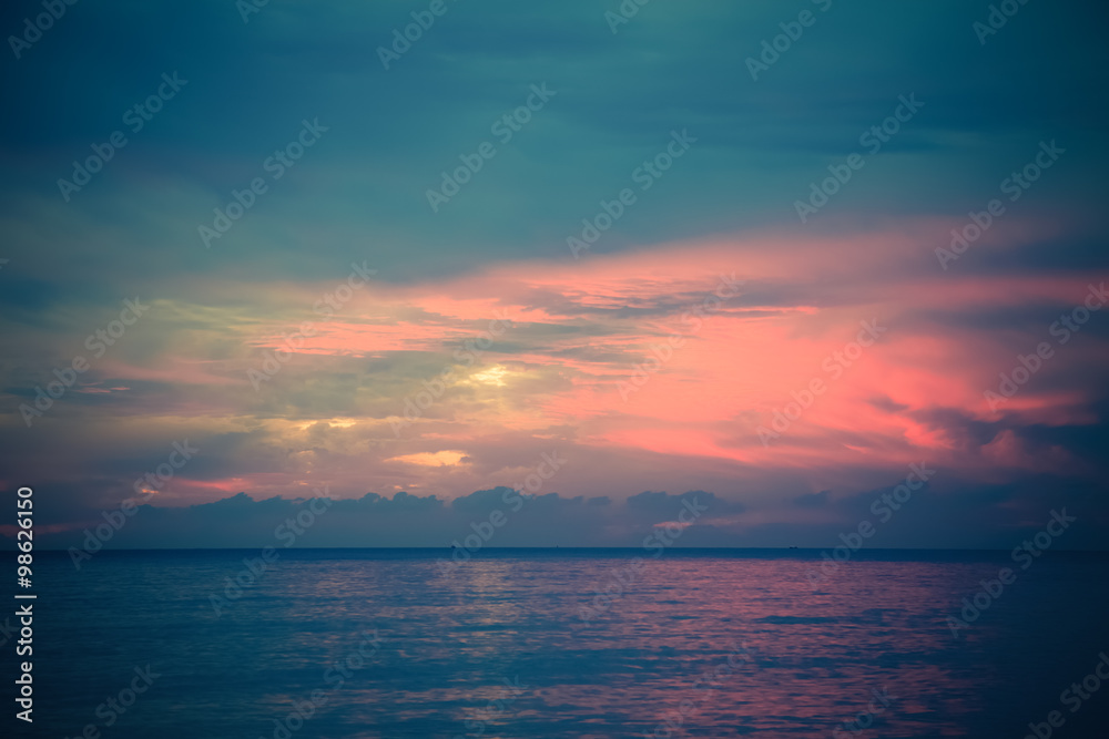 Sea view on the background of beautiful sunset. Toned