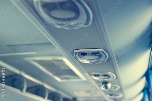 Row of airconditioning system in shuttle bus, making cool fresh air