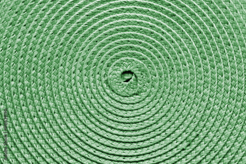 Straw Hat, Whirlpool Woven Pattern Detail, Bleached and Stained Pale Green Grunge Texture. Straw Hat, Whirlpool Woven Pattern Detail, Bleached and Stained Pale Green Grunge Texture.