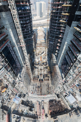 United Arab Emirates, Dubai, 05/21/2015, Damac Towers Dubai by Paramount, construction and building ariel views with cityscape background