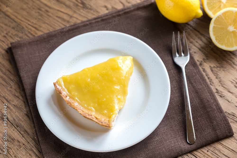 Slice of lemon tart on the plate Slice of lemon tart on the plate
