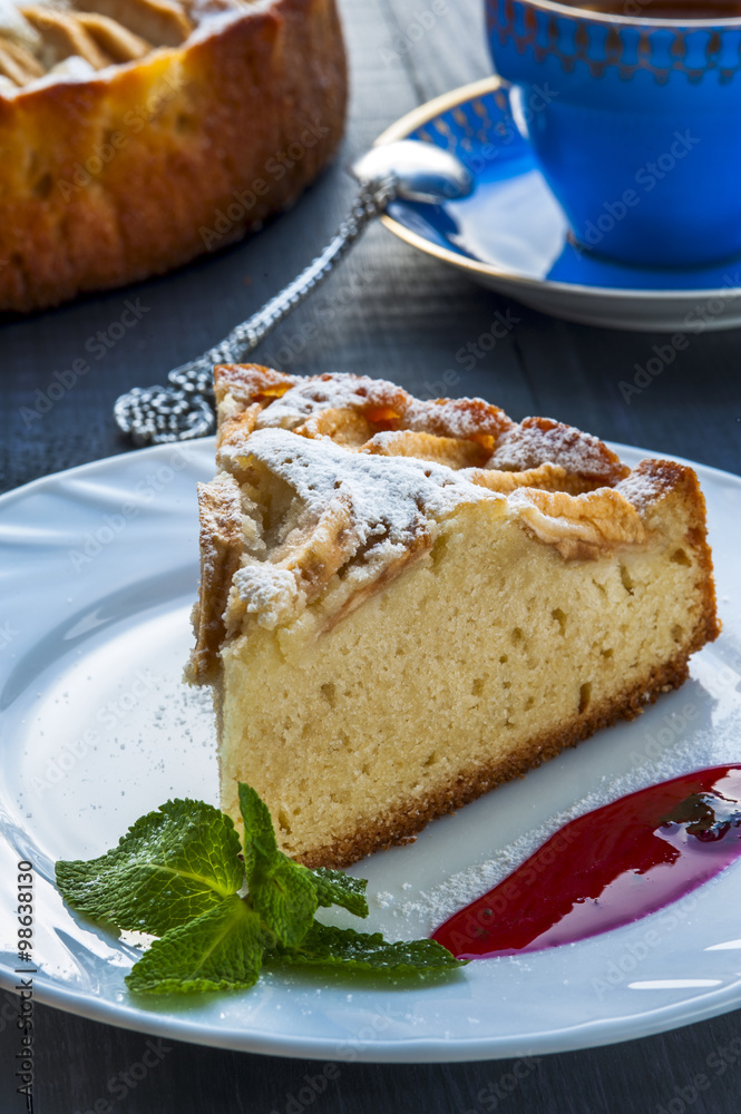 Apple pie with drop of jam on white plate Apple pie with drop of jam on white plate