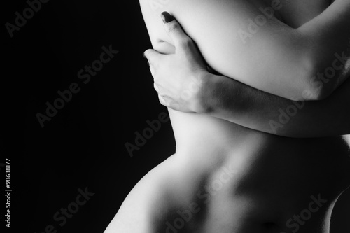 Naked slim womans abdomen