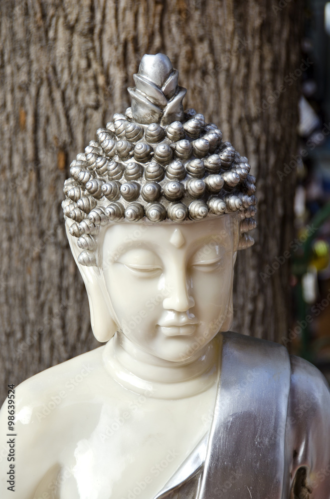 Budha figurine made of metal and marble