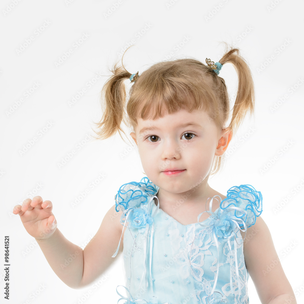 Little girl in blue dress holding a balloon Little girl in blue dress holding a balloon
