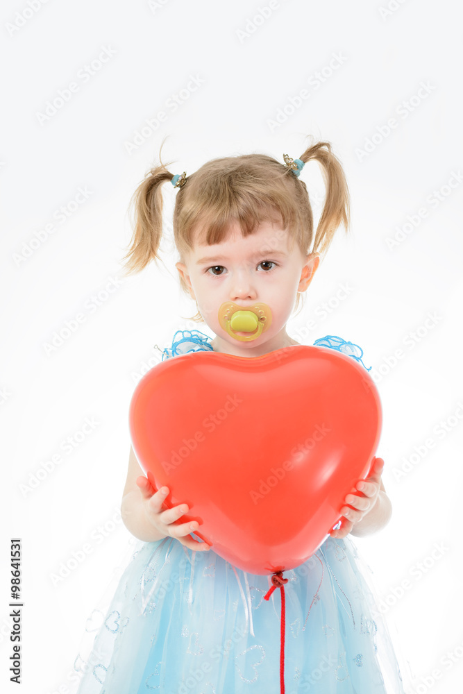 Little girl in blue dress holding a balloon Little girl in blue dress holding a balloon