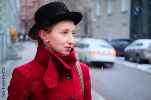 Girl in a red coat