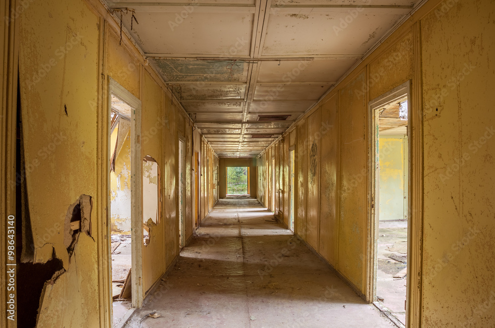 ailing corridor of crumbling barracks