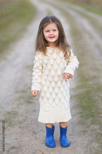 portrait of little girl outdoors in autumn