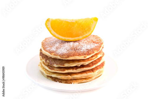 Pancakes with orange isolated on white background