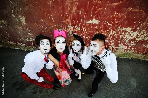 mimes showing thumbs up photo