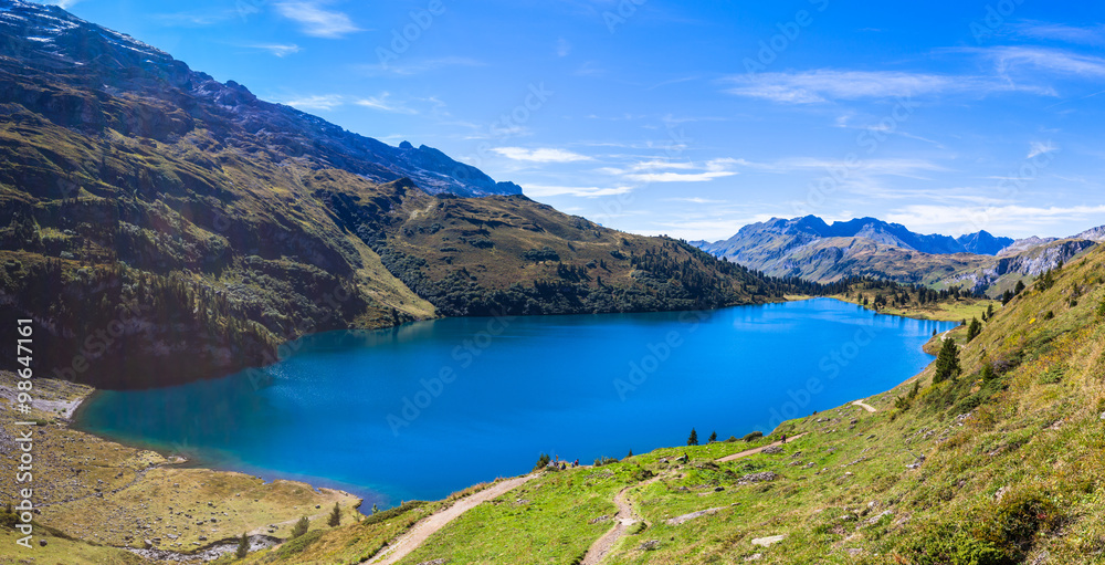 Panorama view of Engstlensee lake and the Alps