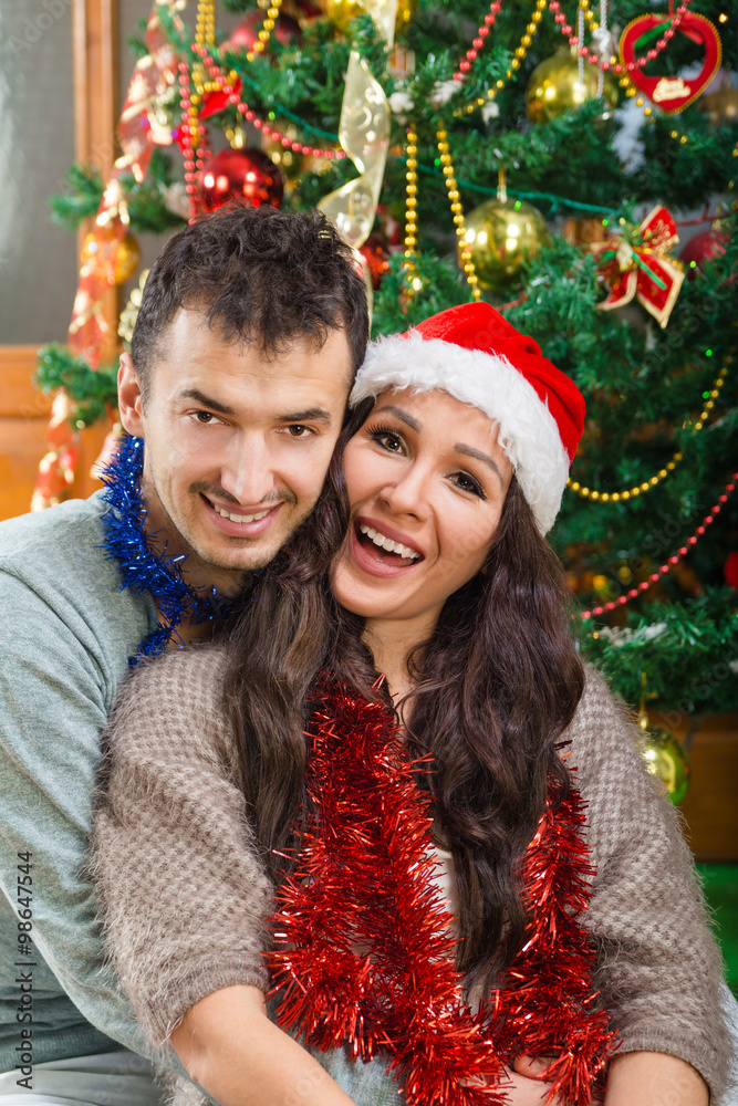 Man and woman at Christmas sharing love and happiness Man and woman at Christmas sharing love and happiness