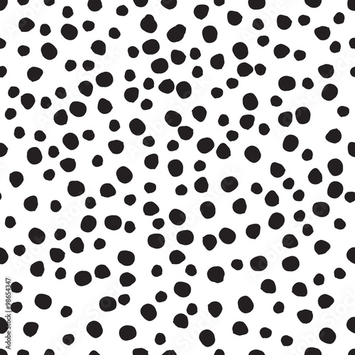 Seamless pattern. Hand drawn polka dot texture vector. Stylish black and white or monochrome doodles. Modern design. Hipster tile print.