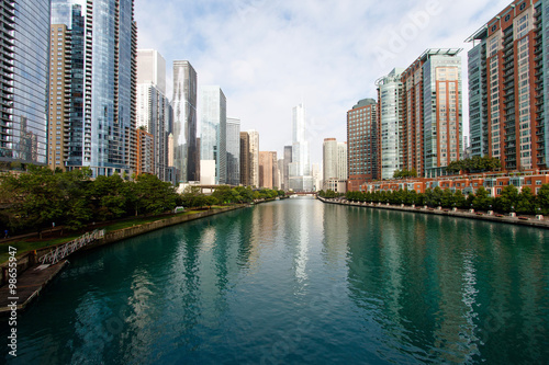 Color DSLR wide angle view of Chicago city skyline as seen up the river; horizontal with copy space for text