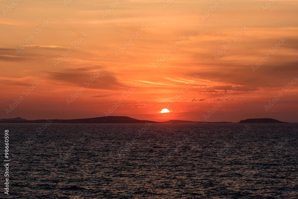 Beautiful sunset on the sea, Naxos island, Cyclades, Greece.