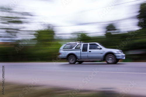 Fototapeta Naklejka Na Ścianę i Meble -  pick-up Speeding in road