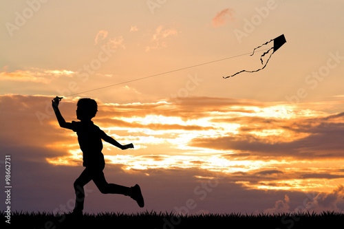 child with kite photo