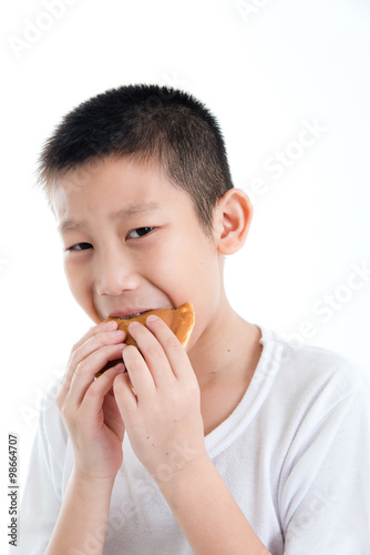 Boy eating dough nut Isolate on white background