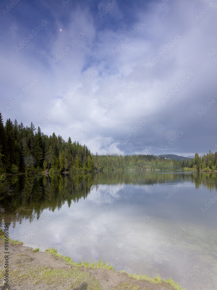Scenic Reflections in Champion Lake, BC, Canada