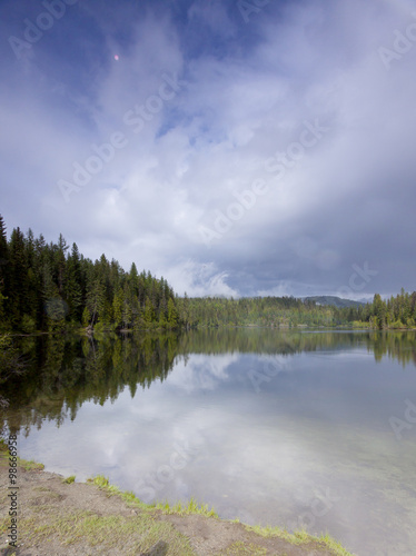 Scenic Reflections in Champion Lake  BC  Canada