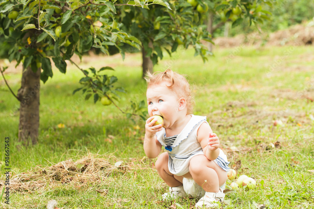 Baby girl under the apple tree Baby girl under the apple tree