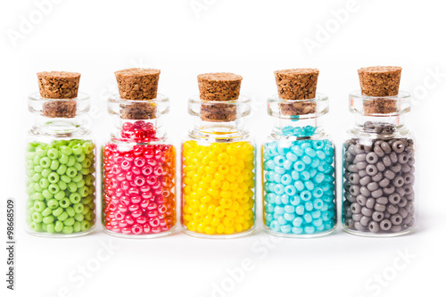 Colorful beads in the bottles