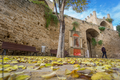 Alcudia Old Town entrance in autumn, Majorca photo