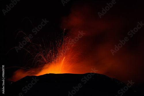 Volcano eruption. Mount Etna erupting from the crater Voragine 