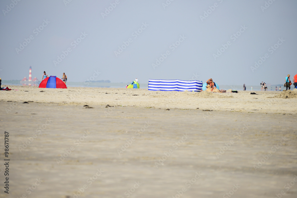 Fototapeta premium St. Peter-Ording mit Blick auf den Westerhever Leuchtturm