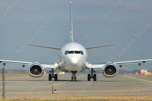 White jet on runway