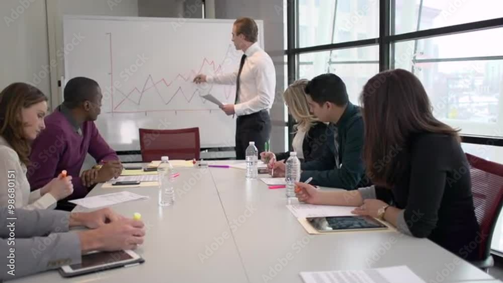 Group of attractive professionals involved in meeting Group of attractive professionals involved in meeting