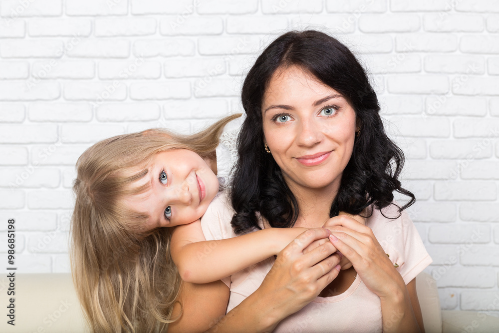 Mother and daughter spending time together at home Mother and daughter spending time together at home