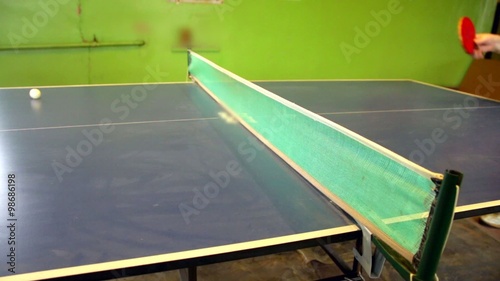 close up of a table tennis player returning