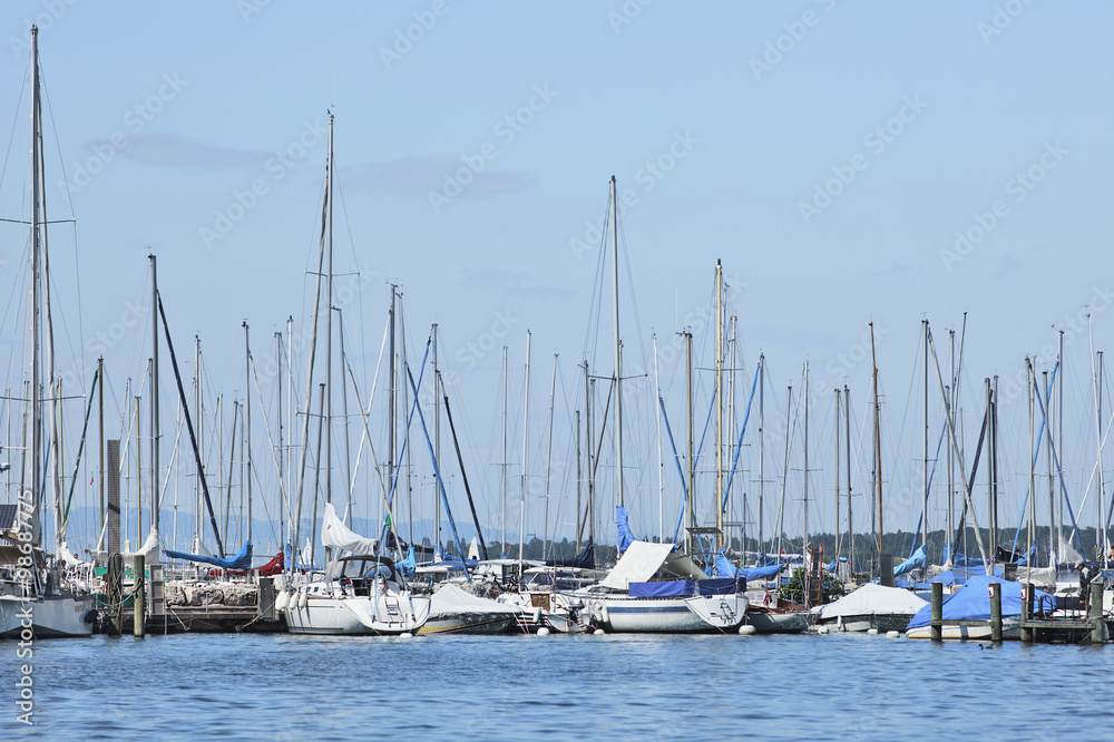 Fototapeta premium Pier with moored white yachts, Lake Geneva, Switzerland