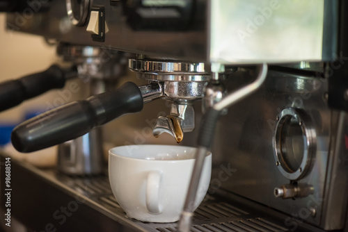 preparing coffee in cafe