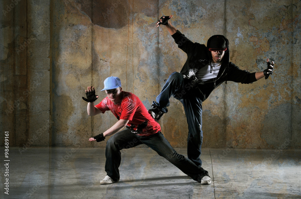 Fototapeta premium Two hip-hop dancers performing