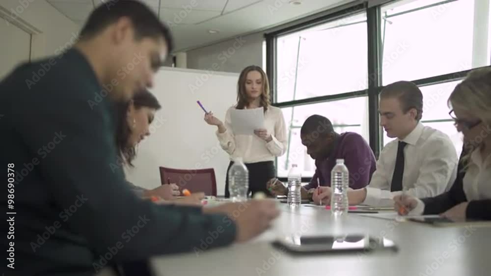 Group of attractive professionals involved in meeting Group of attractive professionals involved in meeting