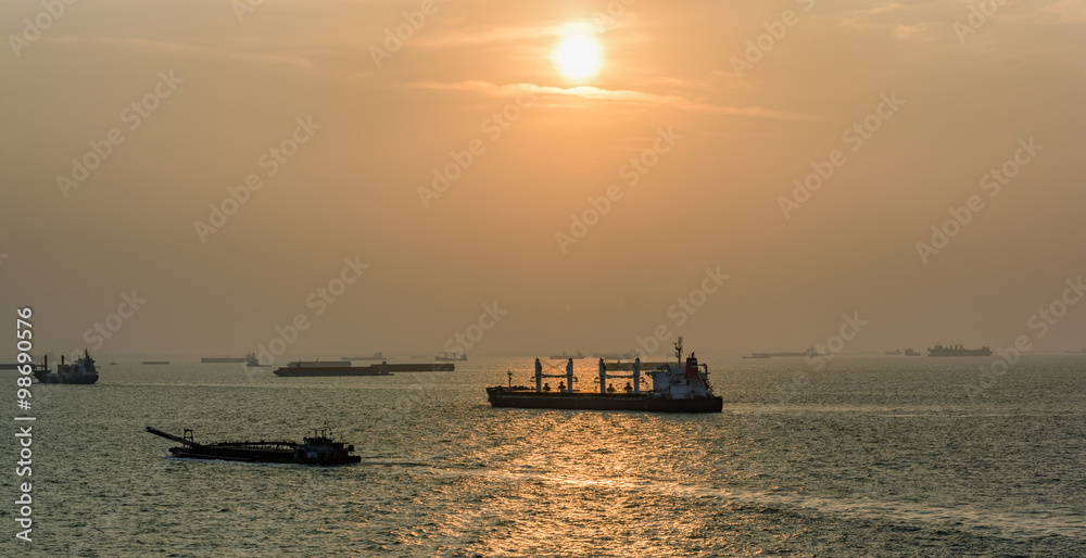 Cargo ships passes Strait of Singapore