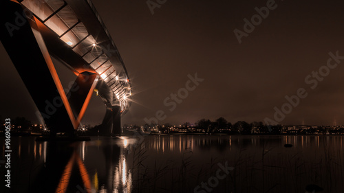 Red bridge at night