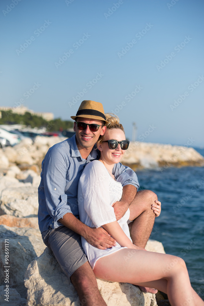 happy young romantic couple in love have fun on beautiful beach