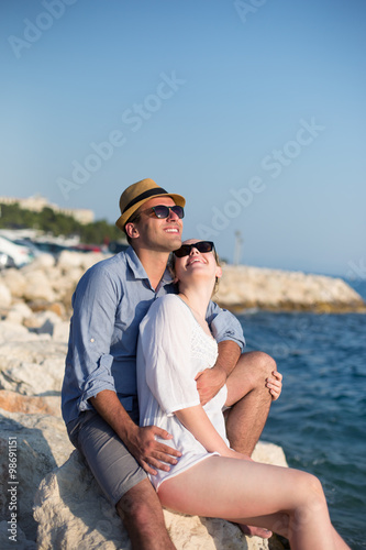 happy young romantic couple in love have fun on beautiful beach