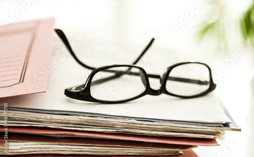 Business file and eyeglasses © sebra
