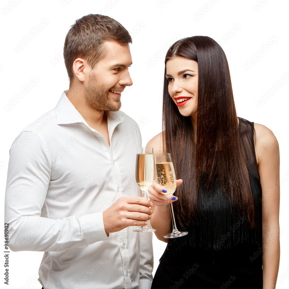 Romantic new year's eve fashion couple toasting with champagne. Romantic new year's eve fashion couple toasting with champagne.