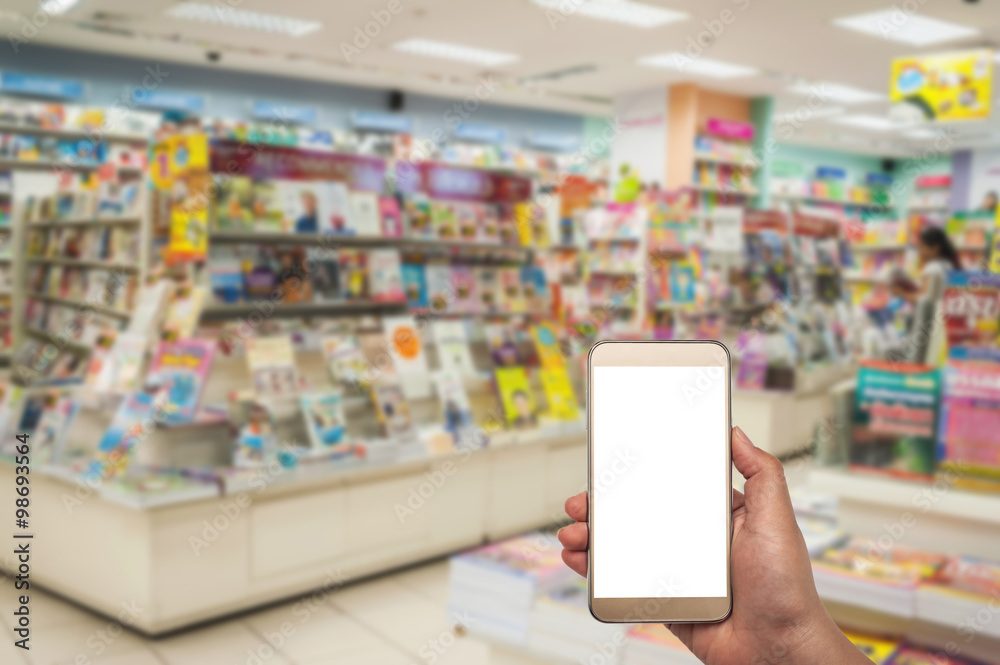 Smart phone white screen in hand on blurred background Smart phone white screen in hand on blurred background