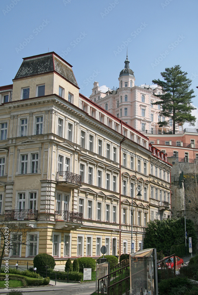 Fototapeta premium KARLOVY VARY, CZECH REPUBLIC - APRIL 20, 2010: Buildings in Karlovy Vary or Carlsbad that is a spa town situated in western Bohemia, Czech Republic