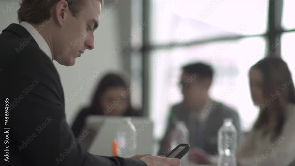Group of attractive professionals involved in meeting Group of attractive professionals involved in meeting